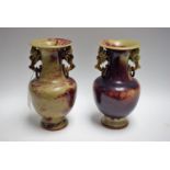 A pair of Chinese monochrome stoneware ovoid vases, everted rims, dragon mask loose-ring handles,