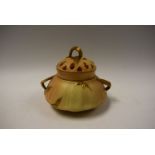 A Royal Worcester blush ivory pot purri and cover, leaf handles, pierced crown cover, shape 1326,