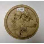 A roundel of two children, Roman style intaglio to reverse, 17.