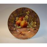 A Royal Worcester shaped circular plate, painted by Peter Love, signed,