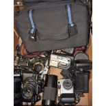 Cameras - a Fujica ST605 SLR camera body, 50mm lens; others, Praktica B200,