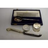 A silver replica of 'The Earliest Christening Spoon', Birmingham 1982, cased; a napkin ring,