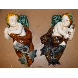 A pair of Majolica wall pockets