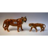 A large Beswick tiger and another,