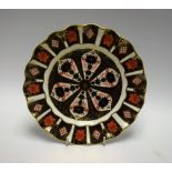 A Royal Crown Derby 1128 pattern shaped circular plate,