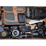 Photographic Equipment - a Canon EOS 850 camera body; a Minolta Dynax camera; a quantity of lenses;