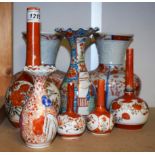 A Japanese Kutani pattern bottle vase; a pair of late 19th century Japanese Imari vases;