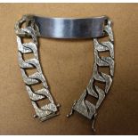 A gentleman's heavy flattened curb identity bracelet,