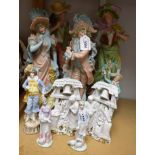 Ceramics - a pair of late 19th century German bisque fairings modelled as a shepherd and