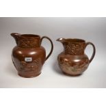 A 19th century Brampton brown salt glazed stoneware jug, in relief with crest flanked by lions,