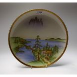 A Japanese Satsuma porcelain circular charger,