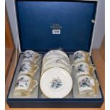 A Royal Worcester Woodland pattern set of six coffee cans and saucers,