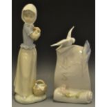 A Lladro Society club bird and scroll,