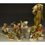 Decorative ceramics - a Lladro figure of a donkey & young boy; a Hummel figure of a Chimney Sweep,