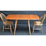 An Ercol dropleaf table;