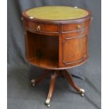 A Regency style mahogany revolving drum bookcase