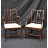 A pair of Georgian style carver chairs