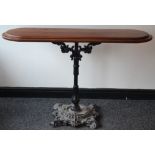 A 19th century cast iron coaching Inn table,