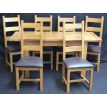 A modern light oak rectangular extending dining table and six ladder back chairs