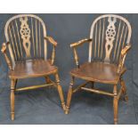 A pair of wheelback carver chairs