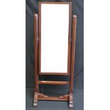 An Edwardian cheval mirror