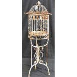A metal white painted bird cage