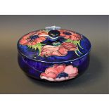 A Moorcroft Anemone pattern bowl and cover