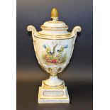 A Royal Worcester two handled pedestal ovoid vase and cover, painted by Terrance Nutt,