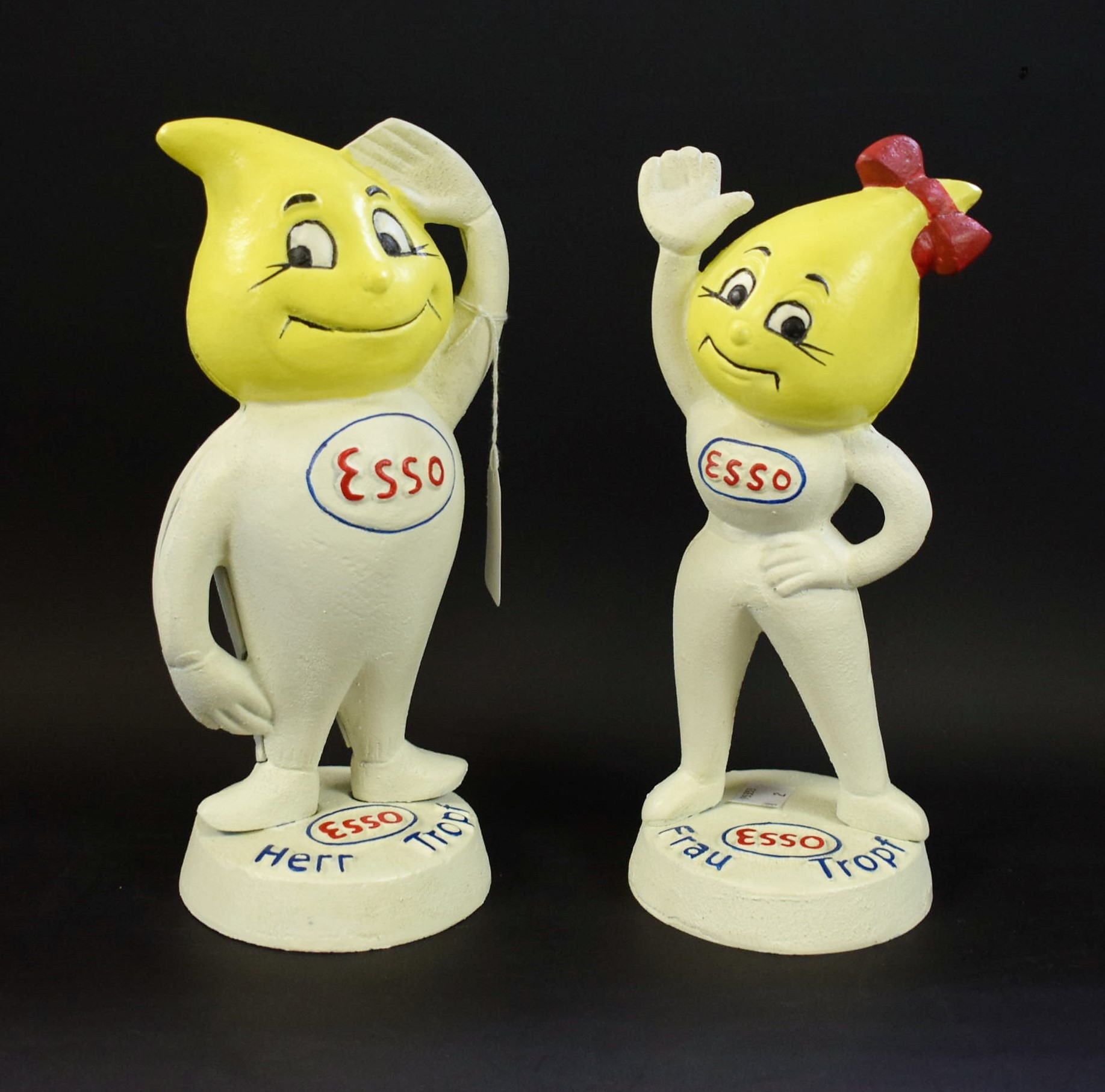 Advertising - a pair of Esso cast metal figural money banks, as Mr and Mrs Drip,