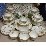 A Minton Haddon Hall pattern tea set for six comprising cream jug, sugar bowl, side plates,