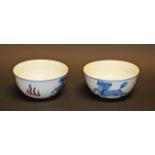 A pair of Chinese porcelain circular tea bowls,