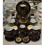 An extensive Denby Arabesque coffee service; ceramic coasters en suite; dinner plates;