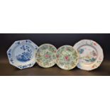 A pair of Chinese Famille Rose plates; an octagonal blue and white plate; another,