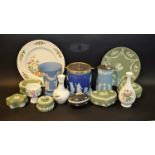 Ceramics - a Wedgwood dark blue Jasperware biscuit barrel; pale blue vase; green trinket dishes,