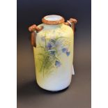 A Noritake two handled vase, decorated with flowers,