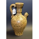 A Portuguese style single handled vase, sgraffito decoration,