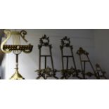 A brass Rococo style table easel, 53.