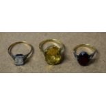 A 9ct gold citrine oval dress ring, 4g gross; others, 9ct gold and silver,