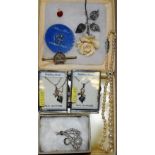 A set of graduated pearls; marcasite flower brooch; bar brooch,