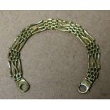 A 9ct gold fancy link gate bracelet, 17.