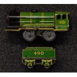 A Mettoy clockwork tinplate 0-4-0 locomotive and tender, green and black livery, Rn 490, with key,