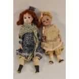 Dolls - a Gebruder Kuhnlenz bisque head doll, glass eyes, open mouth, auburn wig, impressed marks,