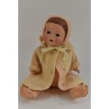 An Armand Marseille bisque head doll, sleeping brown eyes, open mouth, tow upper teeth,