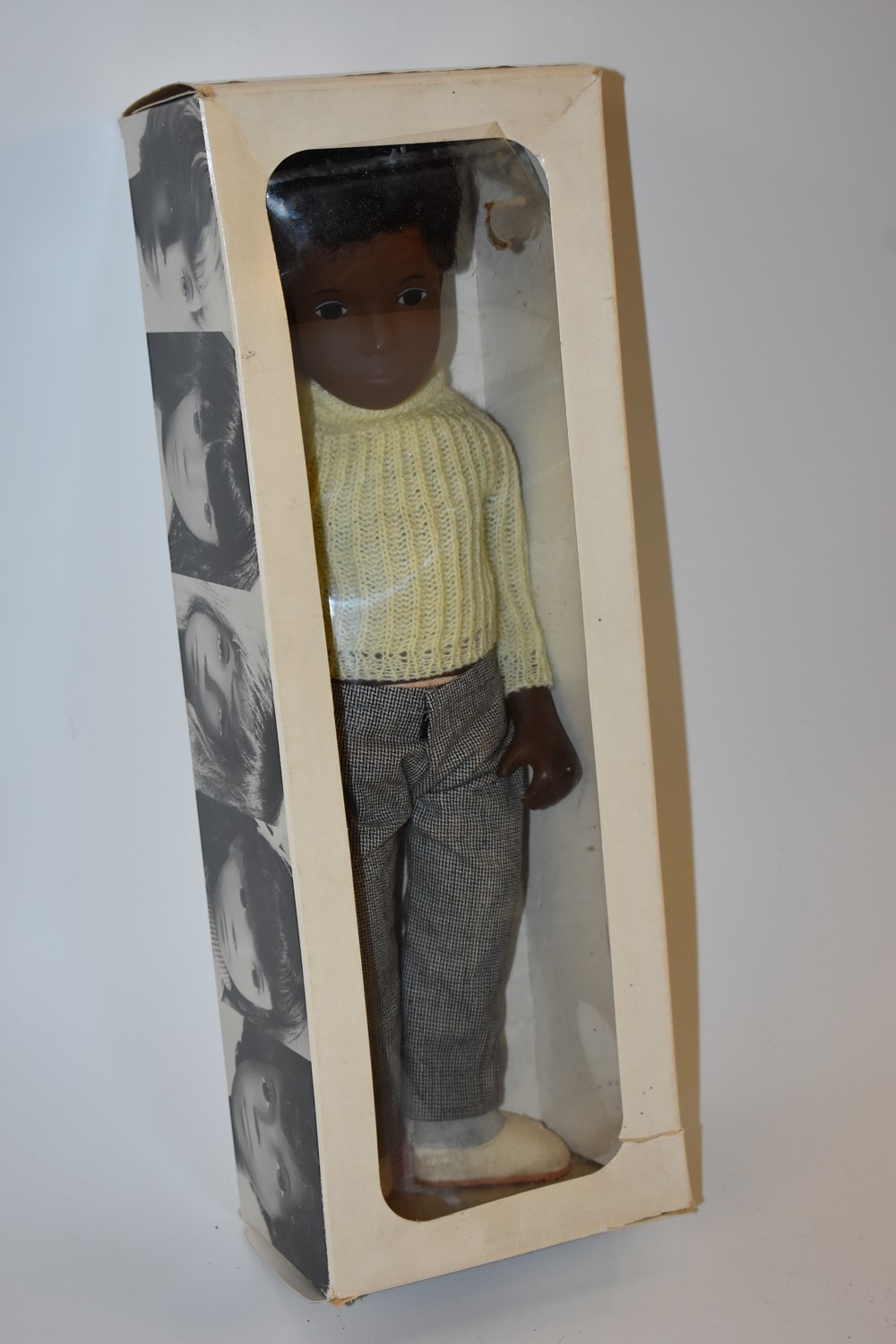 A Trendon Sasha Caleb doll, 309 with brown curly hair and brown eyes, no.