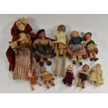 Dolls - a pair of miniature Bavarian composite figures, traditionally dressed boy and girl,
