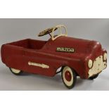 A mid 20th century tin plate pedal car, red livery, 85.5cm long, c.