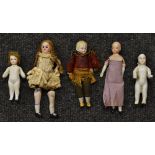 Dolls - a miniature porcelain boy doll.