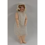 A Kley Hahn Walkure bisque head doll, with sleeping brown eyes, open mouth, four upper teeth,