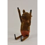 Schuco - a felt covered tip plate clockwork tumbling mouse, brown felt body, red shorts,