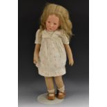 Kathe Kruse - a hand made painted canvas girl doll, brown eyes, closed mouth,